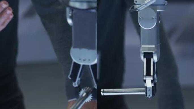 垂直屏幕: 关闭现代机械臂拾取并移动机械金属部件的镜头。总工程师展示了机械臂机器的功能。