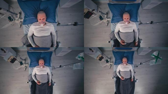 男性患者躺在肿瘤诊所的床上