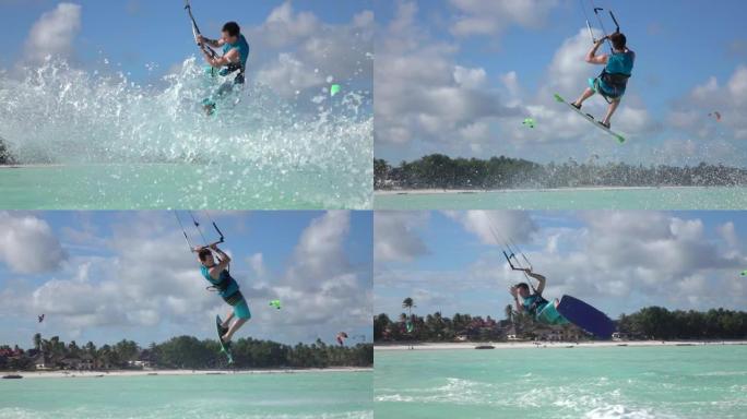 慢动作: 风筝冲浪者尝试技巧撞向绿松石海水。
