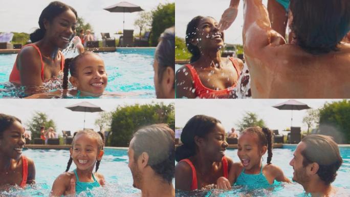 暑假与女儿在游泳池里玩耍的家庭