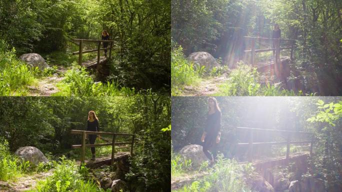适合女人在大自然中徒步穿越溪流桥的户外活动
