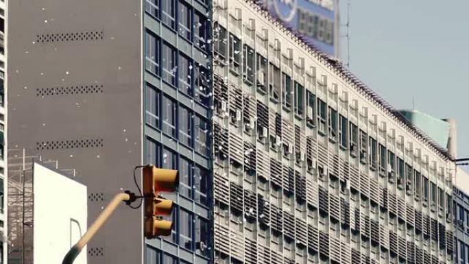在阿根廷布宜诺斯艾利斯，五彩纸屑由从办公楼扔来的无用纸制成，以庆祝年底并象征着过去。4k分辨率。