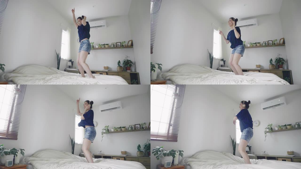 年轻女子在卧室跳舞。