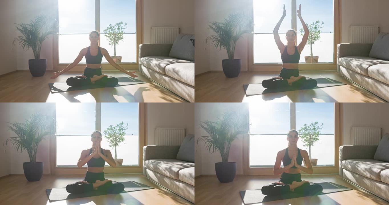 身体意识强的女人保持健康，在客厅在家做瑜伽