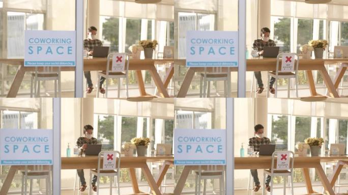 从左到右跟踪镜头: 请将您的社交距离纸质标志放在共同工作空间的镜子上。重新开放后，具有新的常规保护措