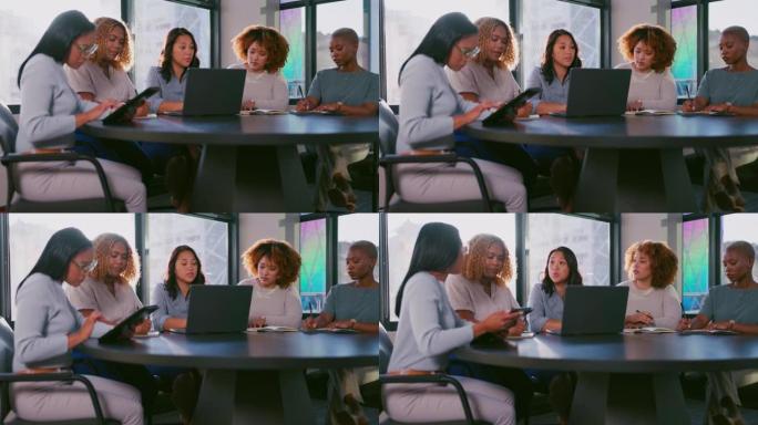 笔记本电脑，研究或创业程序员女性团队，用于在办公室编写想法，应用程序编码或数据分析。关于软件、编程或