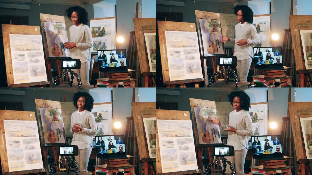 非洲妇女正在互联网上进行艺术课