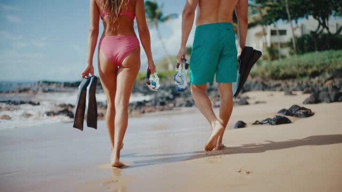 热带海滩度假海滩情侣漫步背影