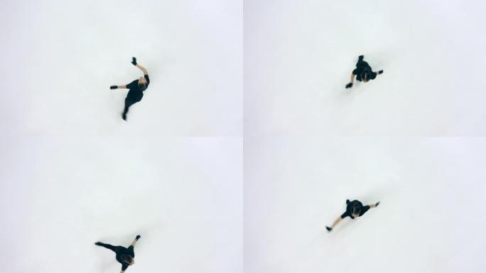 与女性花样滑冰运动员一起滑冰场的俯视图