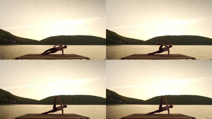女人在湖上练习瑜伽