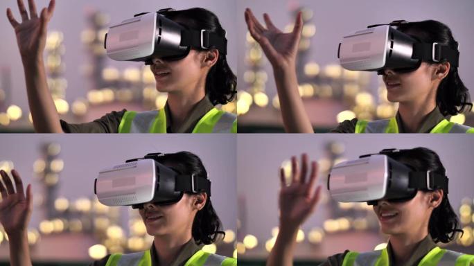 戴虚拟现实耳机和手势的亚洲女工程师