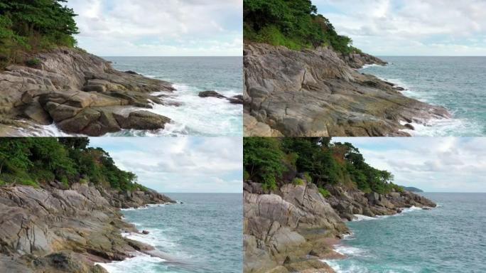 岩石海滩上的波浪大海边浪花海岛拍打石头礁