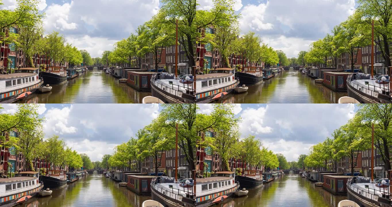阿姆斯特丹有船只和船屋的运河风景如画