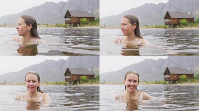 白人妇女在山上旅行时玩得很开心，穿着泳衣和游泳