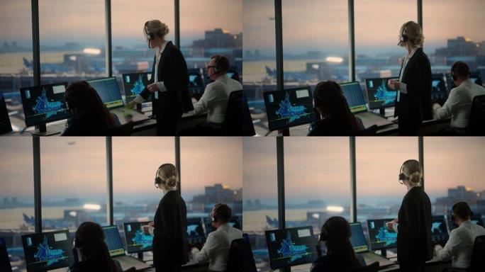 戴着耳机的女性空中交通管制员在机场塔楼通话。办公室充满了台式计算机显示屏，带有导航屏幕，飞机出发和到