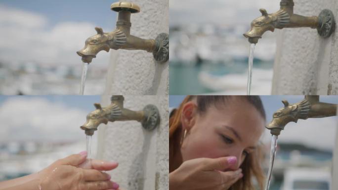 女人从水龙头喝水的特写镜头