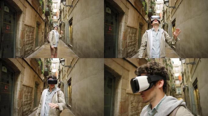 4k视频片段，一个年轻人独自站在巴塞罗那的街道上，戴着虚拟现实耳机