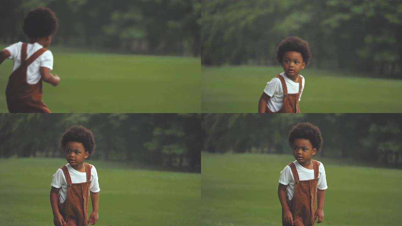 顽固的小男孩黑人小孩向前跑