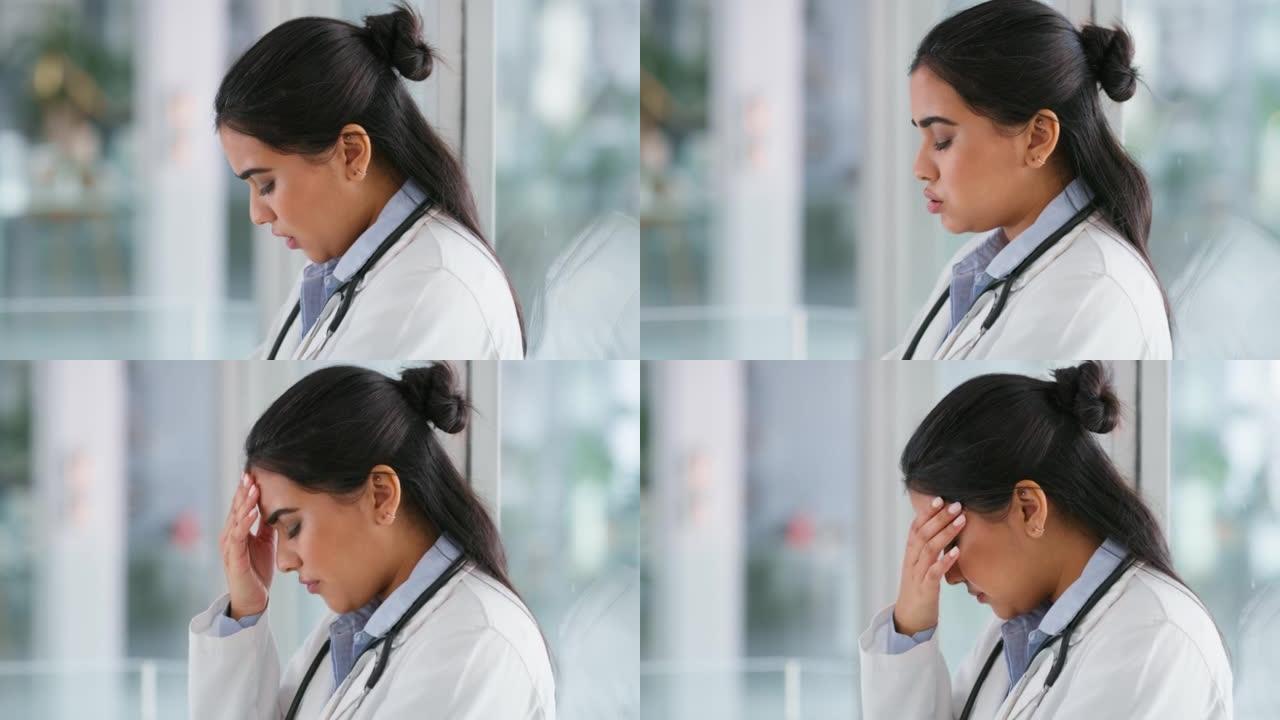 医生与压力，焦虑和精神卫生感到悲伤和痛苦的头痛在她的办公室。医院有疼痛、倦怠、压力或抑郁的医护人员或