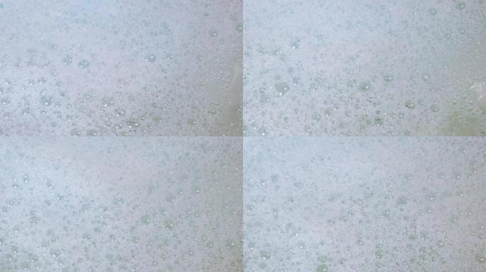 热水浴缸中的纹理背景白色泡沫背景