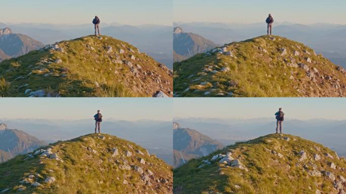 SLO MO Hiker从山顶拍照