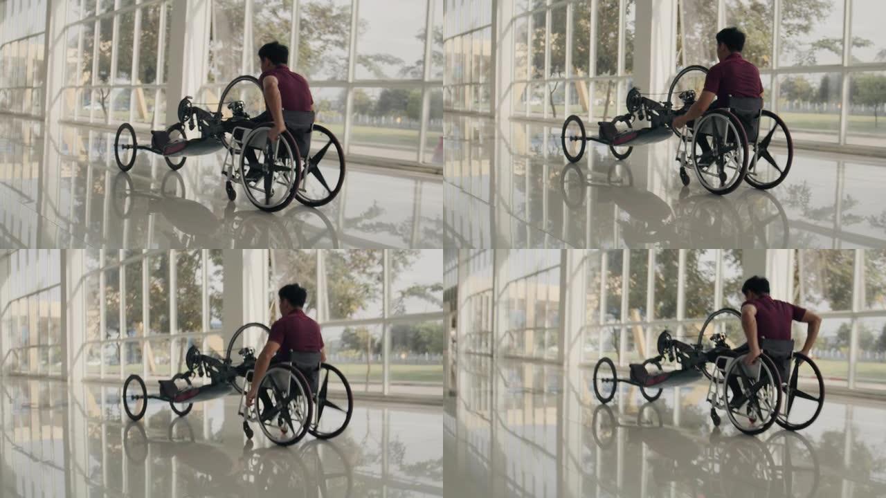 亚洲男子残疾运动员准备手自行车进行训练