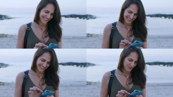 女人，在海滩上旅行和智能手机去希腊度假，在电子邮件或社交媒体上微笑，在岛上自由。幸福，海洋冒险与通信