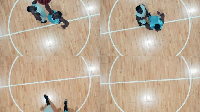 篮球运动员的慢动作在跳跃中收集球