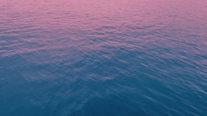 海上日出粉红光移动镜头