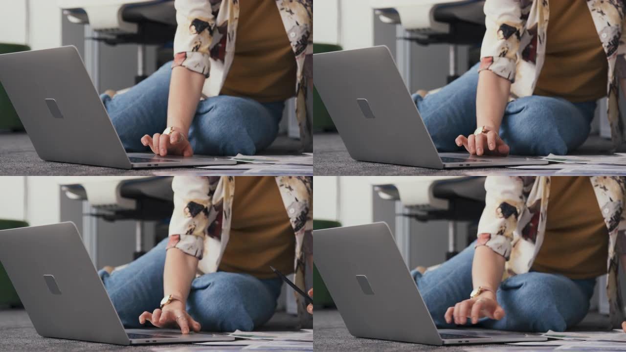 无法辨认的女人使用笔记本电脑