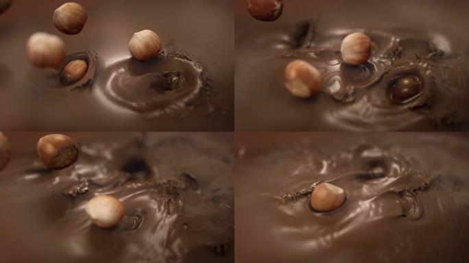 榛子在4k超慢动作中溅到液态牛奶巧克力中