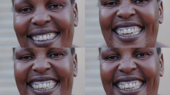 特写裁剪面部肖像的微笑黑人非洲成年妇女