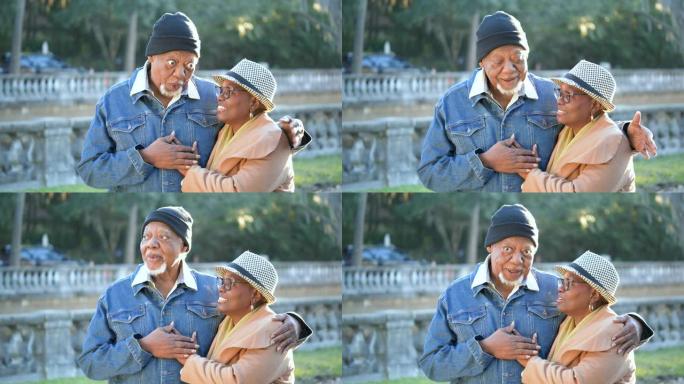 老年非裔美国夫妇在户外交谈