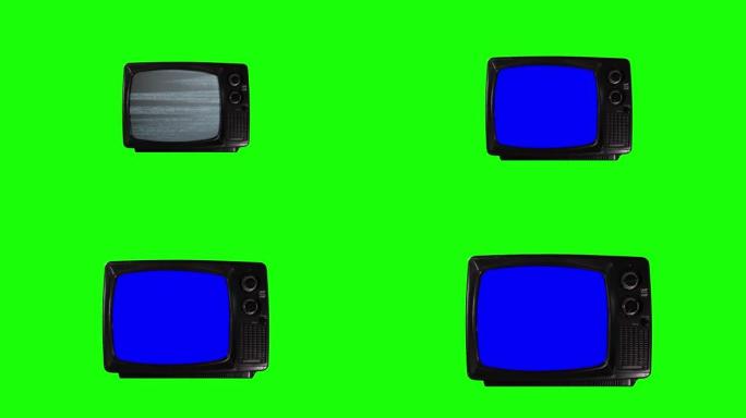 复古电视在绿色背景上打开蓝屏。放大。