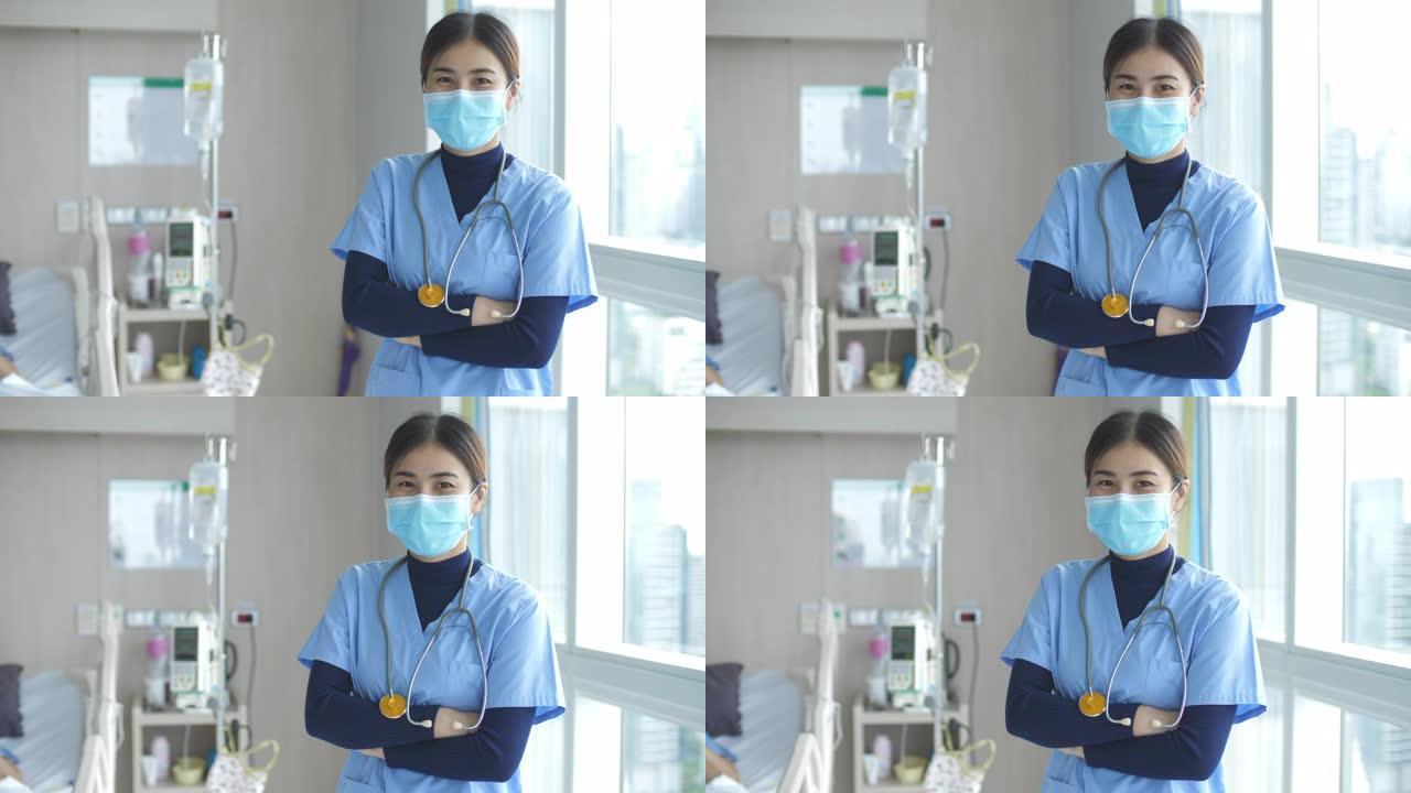 专业工作，护士在医院口罩下微笑看着相机