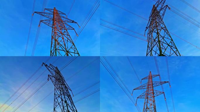 电力塔和电线对抗晴朗的蓝天