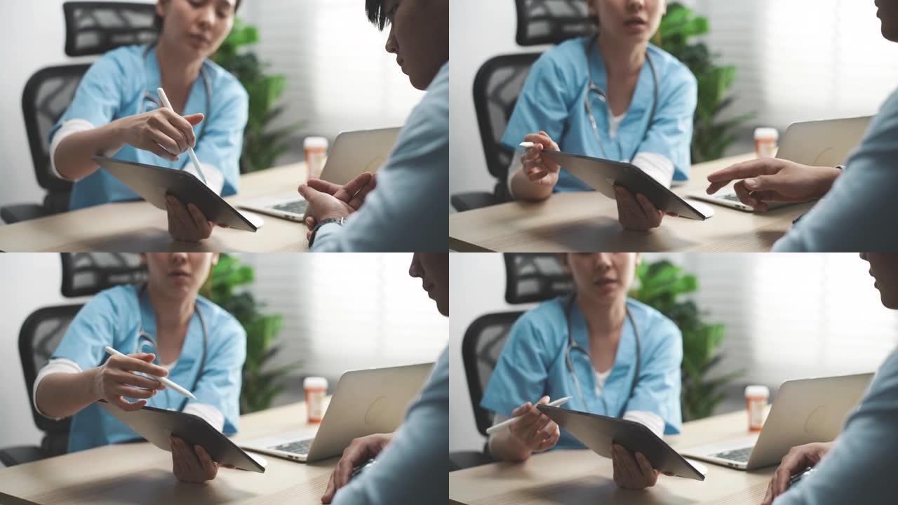 女医生在医疗咨询时在数字平板电脑上交谈咨询病人