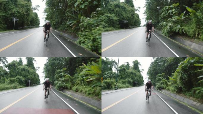 高速公路上的亚洲男子自行车。