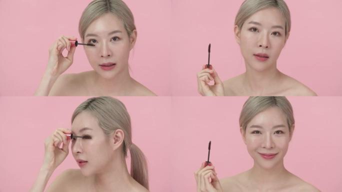 亚洲女人用睫毛刷涂睫毛膏的特写美女肖像。