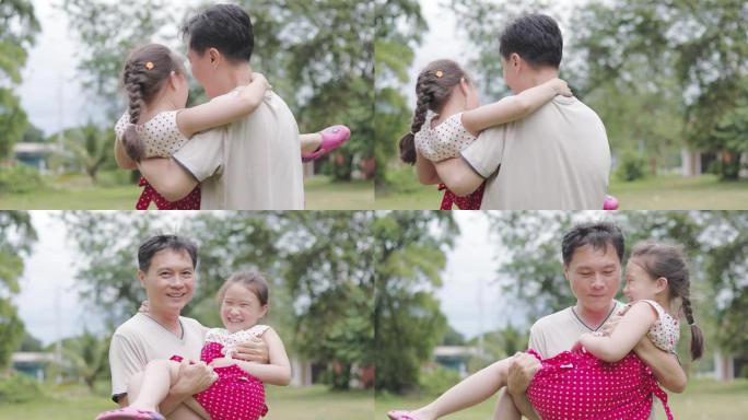 父亲抱女儿纺纱，父亲玩女儿