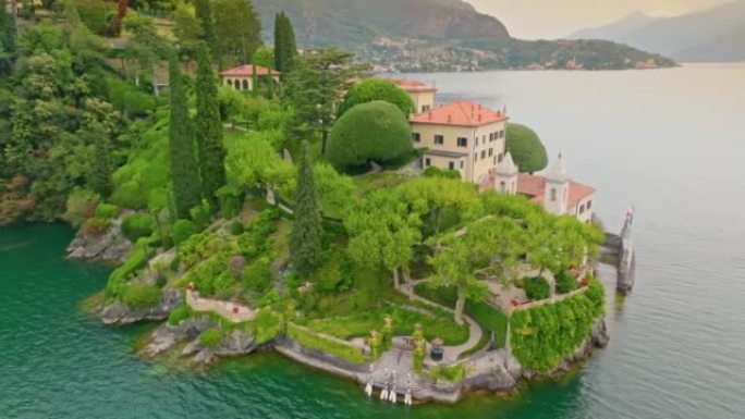 意大利科莫湖巴尔比亚内洛别墅的鸟瞰图。海岸上美丽的花园和别墅。意大利伦巴第大区科莫湖特雷梅齐纳。4K