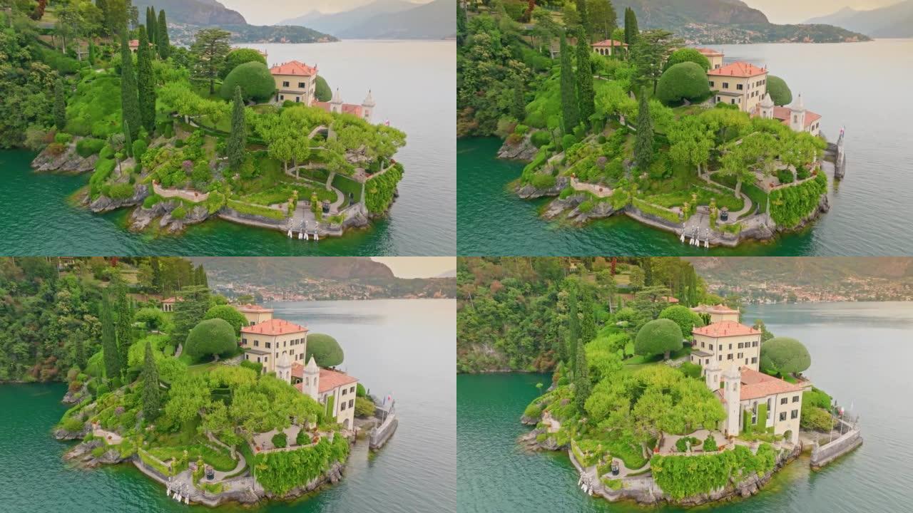 意大利科莫湖巴尔比亚内洛别墅的鸟瞰图。海岸上美丽的花园和别墅。意大利伦巴第大区科莫湖特雷梅齐纳。4K