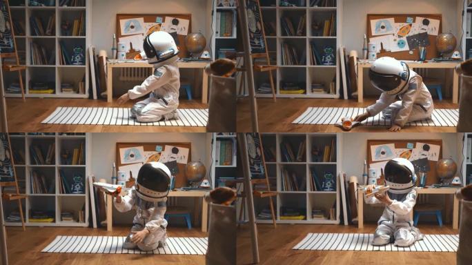 梦想太空旅行。穿着太空服的快乐小孩，头盔扮演火箭飞船飞行员，在他的房间里飞行玩具
