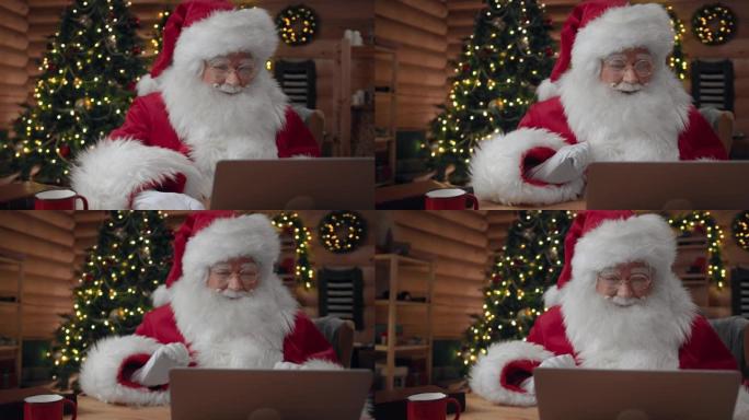 圣诞老人正在使用笔记本电脑进行视频聊天
