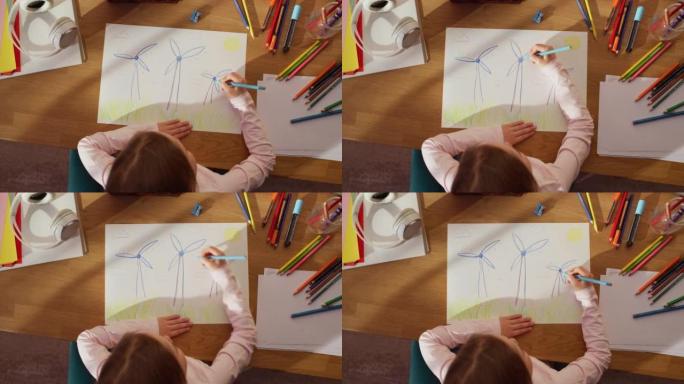 Top View: Little Girl Drawing Beautiful Wind Turbi