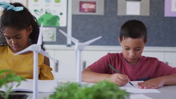 多样化的学童，学习风能和可再生能源