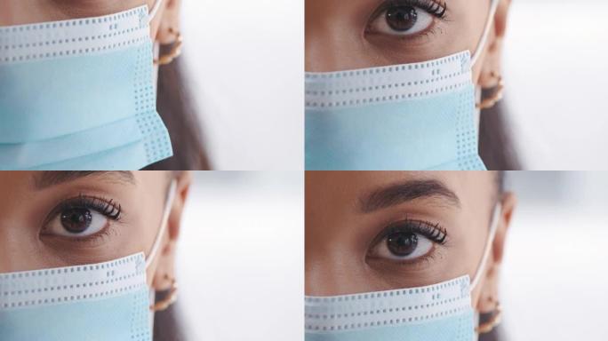 一名戴着外科口罩的年轻女子的4k录像