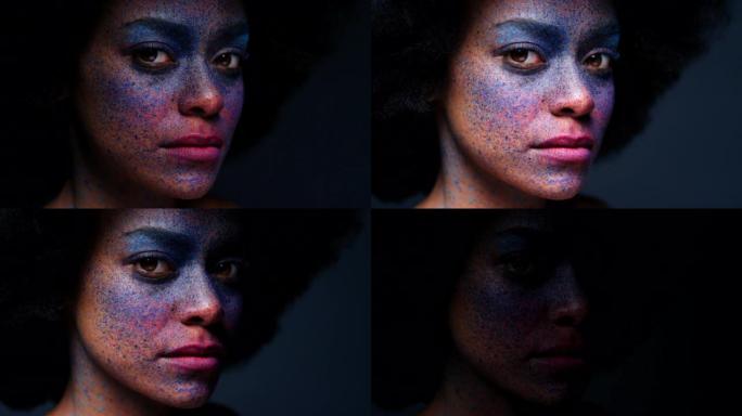 深色工作室背景上的彩色面漆化妆，黑人女性肖像和抽象，创意艺术和幻想化妆品。非洲艺术家模型，皮肤上大胆