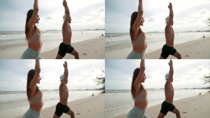 两个人在海滩锻炼健身教练海边健身海边瑜伽