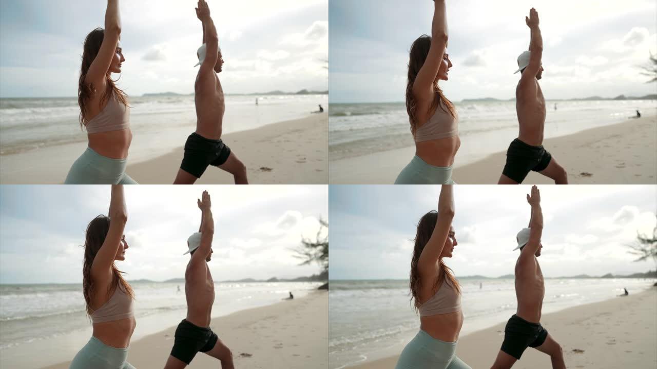 两个人在海滩锻炼健身教练海边健身海边瑜伽